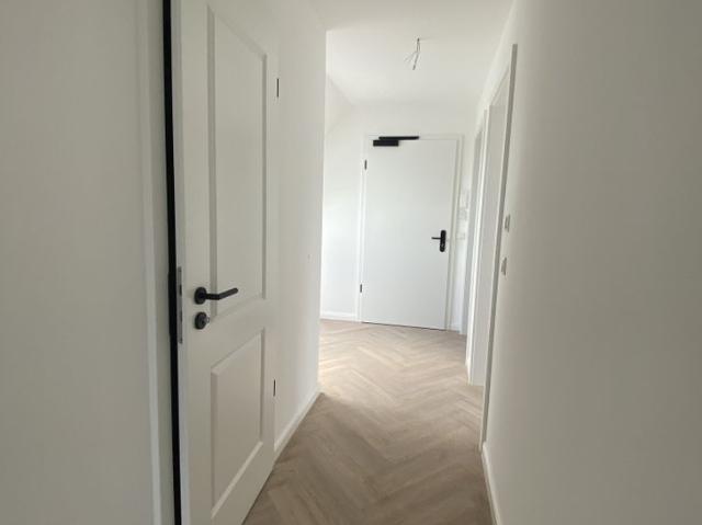 Neubau Energiestandard KfW55 ! Großzügige 2 Zimmer Dachgeschoss Wohnung mit Balkon