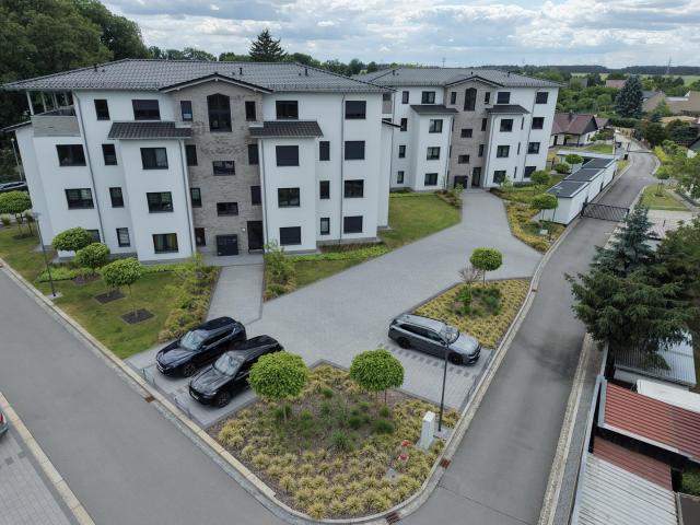 Moderne 4 Zimmer Wohnung mit großzügiger, überdachter Terrasse/Balkon, Aufzug & Wärmepumpe