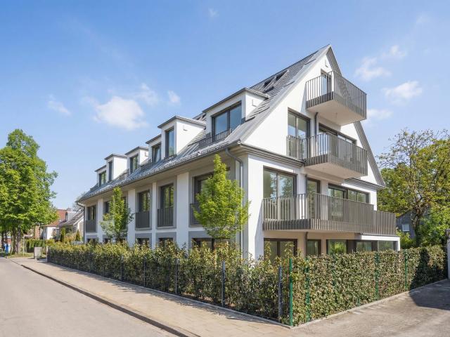 Neubau: Familienfreundliche 4 Zimmer Gartenwohnung mit luxuriöser Ausstattung und Süd West Garten