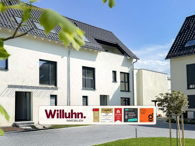 Neubau Haus mit sonniger Loggia in exklusiver Wohnanlage l Garage l Wärmepumpe