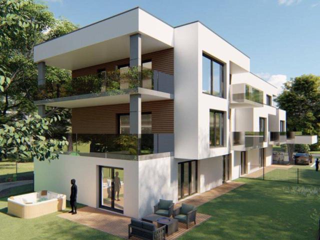 Neubau: Sonnige Gartenwohnung mit großer Terrasse u. Parkplatz