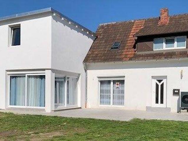 Neubau und Altbau im harmonischen Einklang vereint
