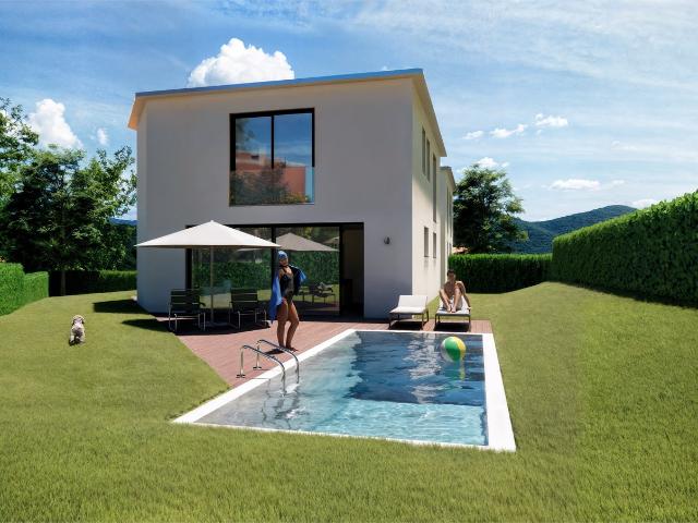 Neue Immobilie in Collina d’Oro: Eine Villa mit Swimmingpool und zwei Wohnungen