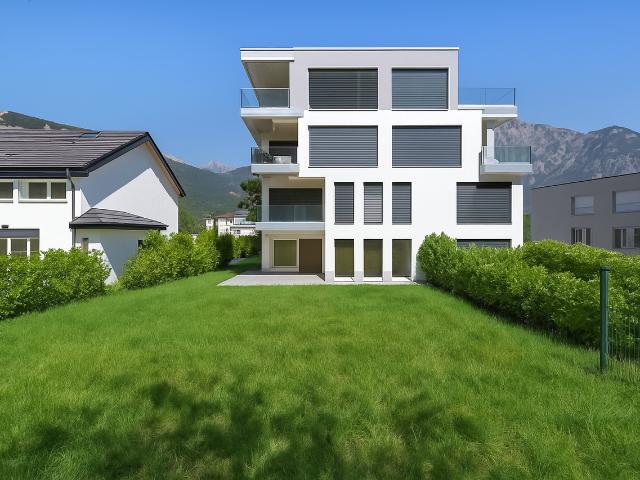 Neue 2.5 Zimmer Wohnung mit grossem Garten und Terrassen