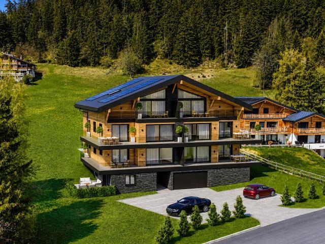 Neue 3.5 Zimmer Wohnung mit Terrasse und privatem Garten in Crans Montana