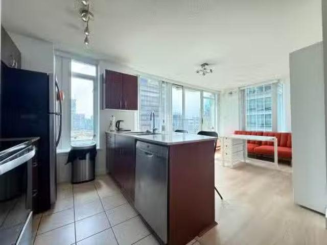 Cozy 1 BR 1407 610 Granville Street, Vancouver, BC, V6C 3T3.