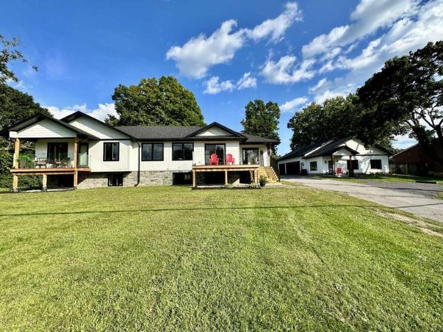 New build waterfront home + detached guest suite