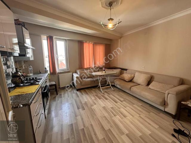 New Emlak'tan Zafer'de Eşyalı Kiralık 1+1 Apart Daire