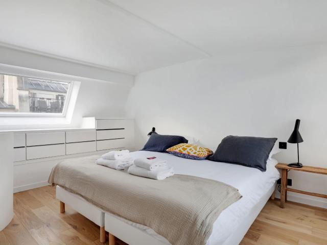 Newly refurbished, cosy and atypical flat, quiet and bright with a beautiful French window over the entire height of the room