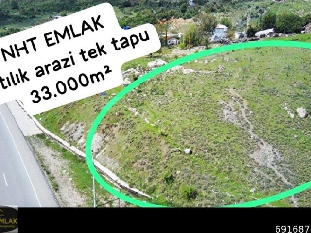 NHT'den Kumluca Adrasan Olimpos manzaralı yola sıfır satılık 33.000 m2 arazi