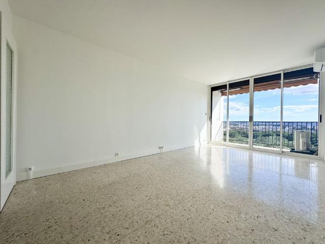 NIMES / PUECH DU TEIL T3 AVEC CLIMATISATION, LOGGIA, BALCON, DOUBLE GARAGE ET CAVE
