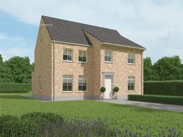 Nieuw te bouwen alleenstaande woning met vrije keuze van architectuur te Desselgem