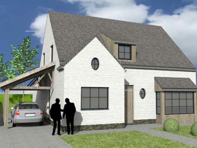 Nieuw te bouwen alleenstaande woning met vrije keuze van architectuur te Desselgem
