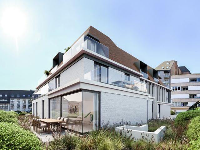 Nieuw, luxueus afgewerkt, hoek tuinappartement gelegen in e
