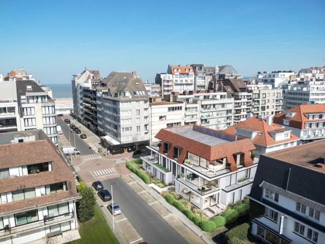Nieuw, luxueus afgewerkt, hoekappartement gelegen in een ex