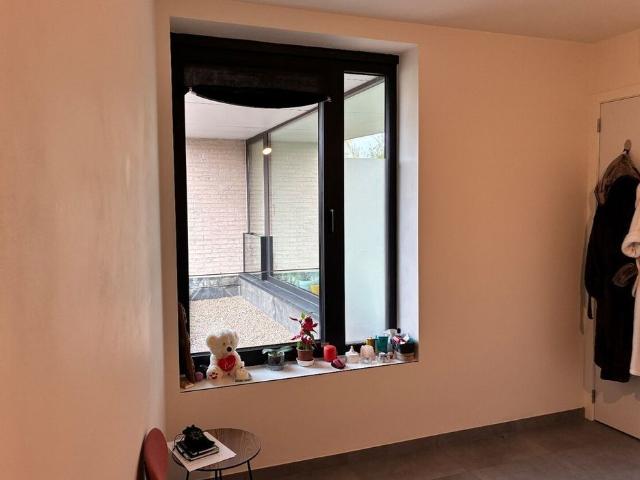 Nieuwbouwwoning op 50m van tramhalte met terras en tuin !