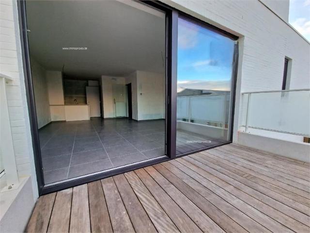 NIEUWBOUW APPARTEMENT MET 2 SLAAPKAMERS IN NIEUWBOUW RESIDENTIE OP EEN BOOGSCHEUT VAN ZEE