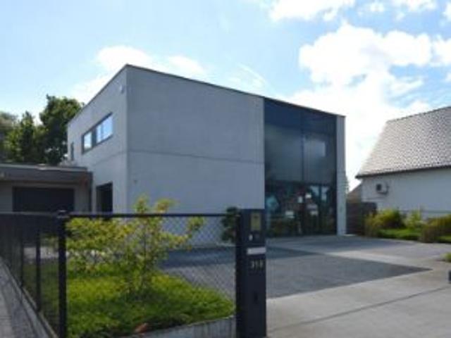 Nieuwbouw woning met kantoor/commerciële ruimte te Boortm.