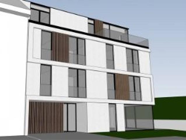 Nieuwbouwappartement + lift met 2 slaapkamers en ruim terr