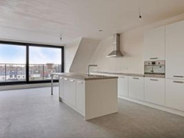 Nieuwbouwappartement met 1 slaapkamers en lift in het cen.
