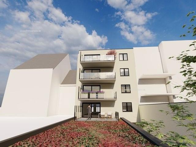 Nieuwbouwproject te Zottegem: Ruime Appartementen en Handelsruimte in het Centrum