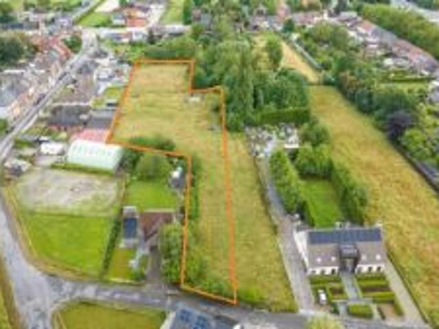 NIEUWERKERKEN Bouwgrond voor HOB met weide op +/ 50are