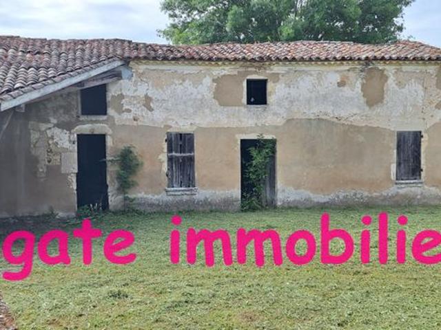 Noaillan batisse ancienne a restaurer sur terrain constructible
