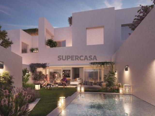Nova moradia geminada V2 com jardim, piscina e terraço privativo Almancil
