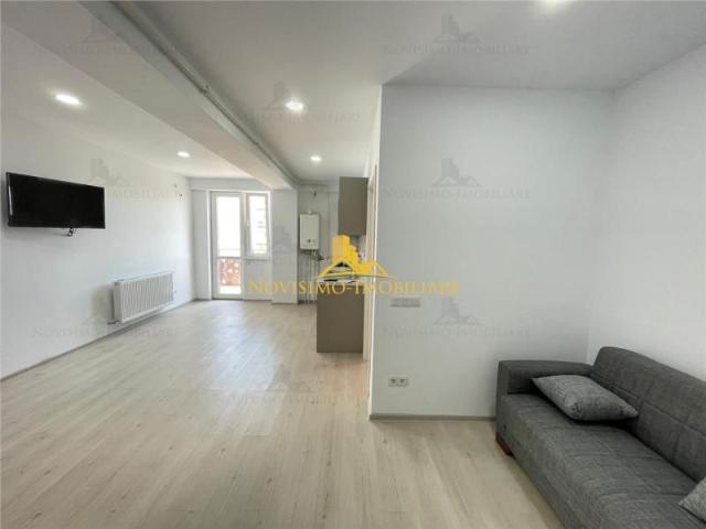 NOVISIMO IMOBILIARE: APARTAMENTU CU DOUA CAM. IN ZONA 9 MAI de inchiriat