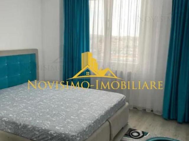 NOVISIMO IMOBILIARE: APARTAMENT CU 3 CAM. SI DOUA BAI IN ZONA 9 MAI de inchiriat