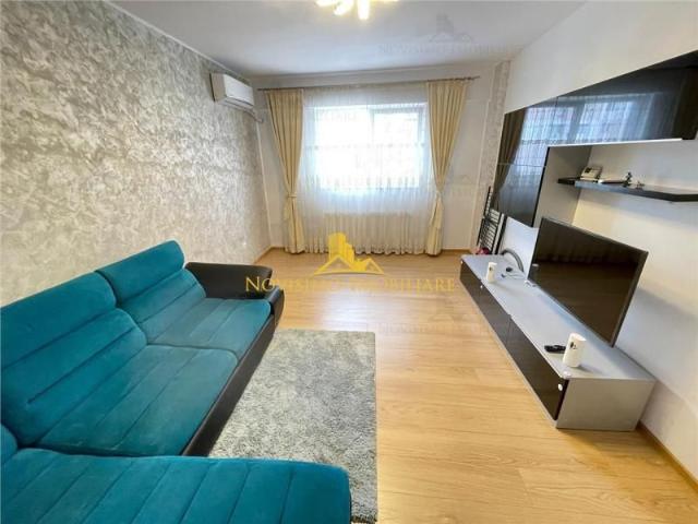 NOVISIMO IMOBILIARE: APARTAMENT DE INCHIRIAT CU DOUA CAM. IN ZONA 9 MAI de inchiriat