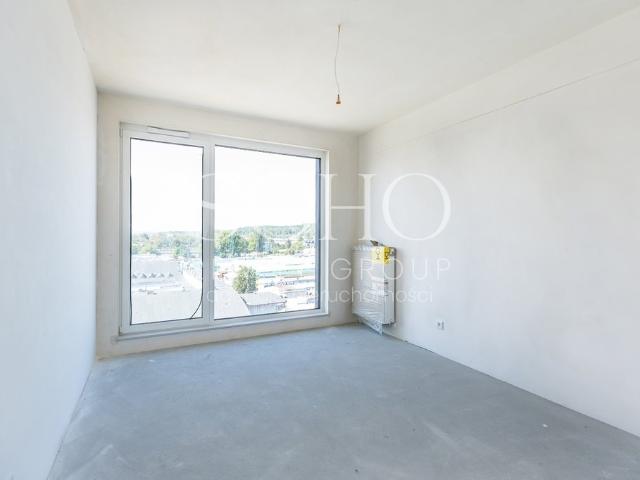 Nowoczesny 59 m² apartament z balkonem klimatyzacją i miejscem garażowym
