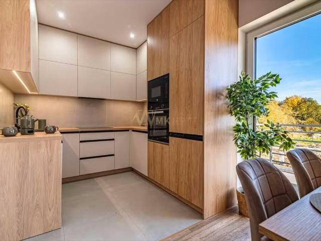 Polecam nowoczesny 60 m² apartament z tarasem i 2 miejscami parkingowymi
