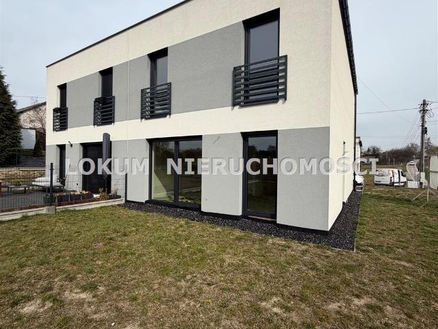Nowoczesny bliźniak 126 m2 z garażem i ogródkiem
