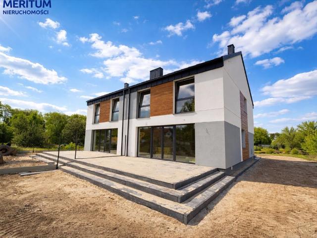 Nowoczesny bliźniak 137m2 z garażem i dużą działką