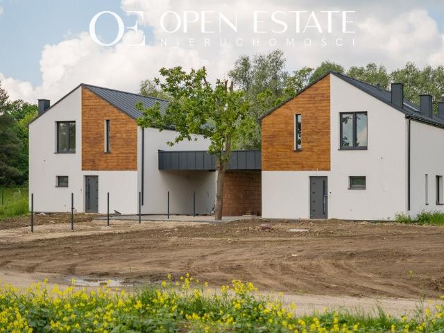 Nowoczesny dom 106 m² z 4 pokojami, garaż i działka