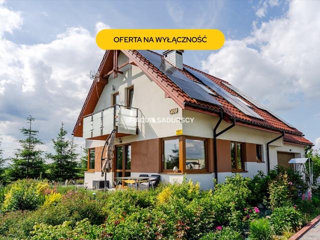 Nowoczesny dom 154m² z garażem, kominkiem i fotowoltaiką