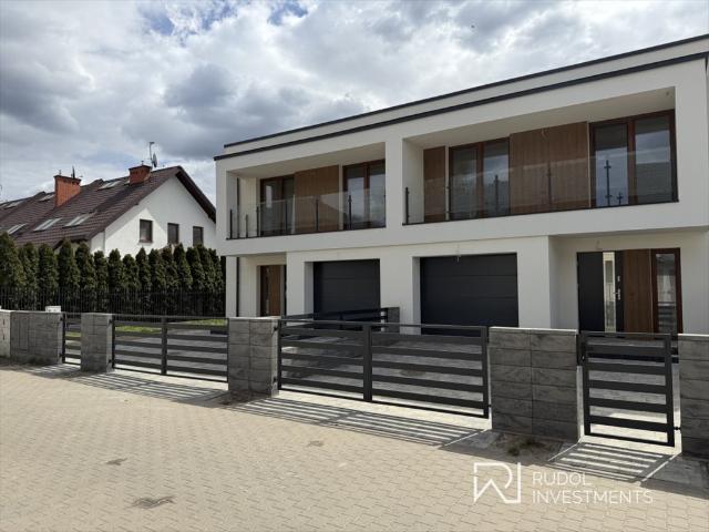 Nowoczesny dom bliźniaczy 125 m² z garażem i ogrodem
