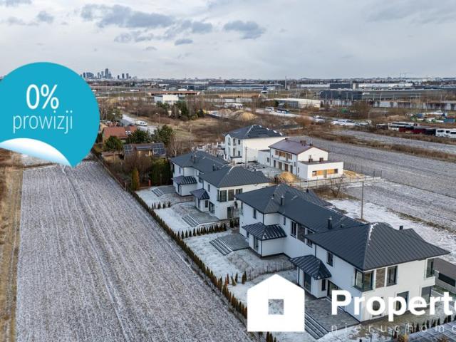 Nowoczesny dom bliźniaczy 210 m² z ogrodem i garażem