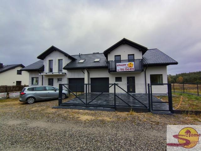 Nowoczesny dom bliźniak 134 m2 z garażem i ogrodem