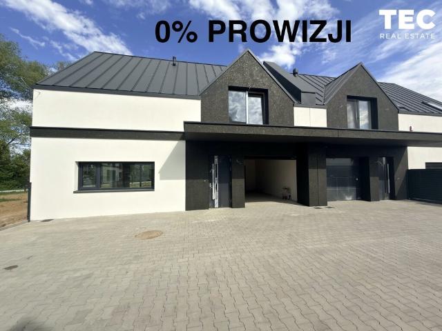 Nowoczesny segment 130 m² z ogrodem, garażem i technologiami