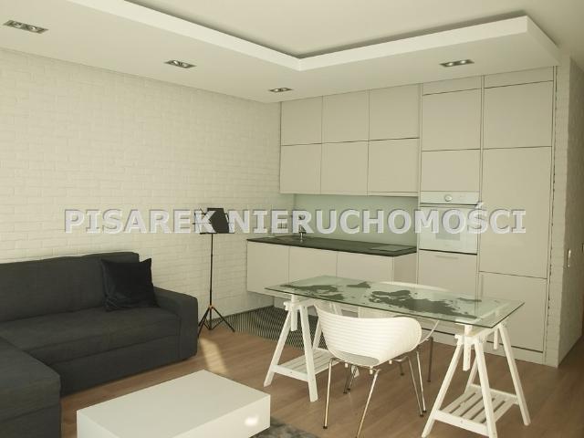 Nowoczesny 2 pokojowy apartament z balkonem i garażem