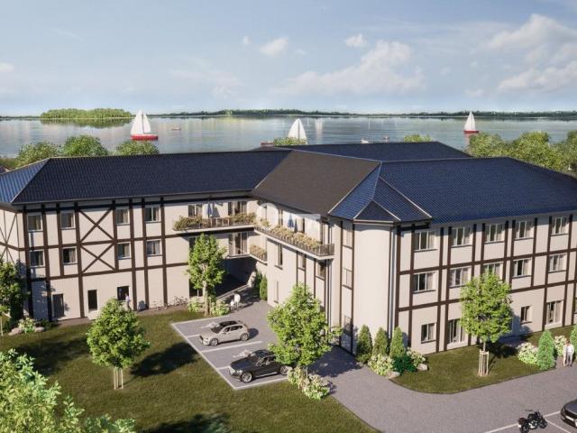 Nowoczesne mieszkanie nad jeziorem z prywatną plażą