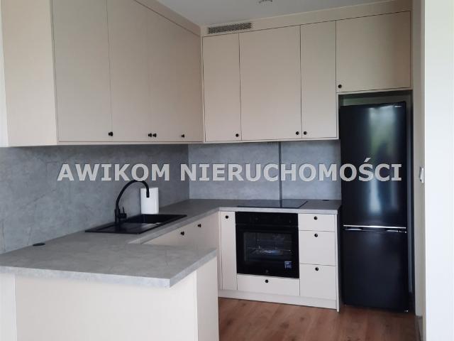 Nowoczesne mieszkanie z balkonem i garażem