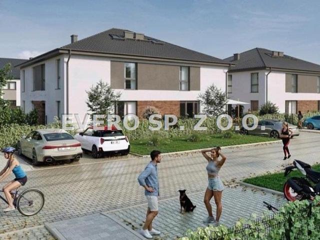 Dwupoziomowe apartamenty z ogródkami i parkingiem