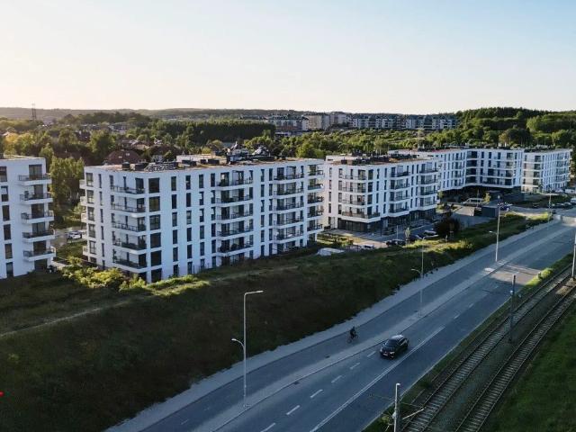Nowoczesne 2 pokojowe mieszkanie z balkonem i miejscem garażowym