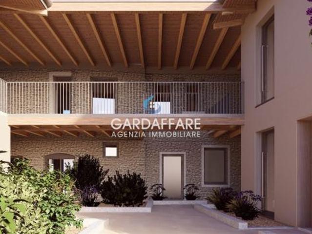 NUOVO TRILOCALE PIANO TERRA VISTA LAGO DI PROSSIMA REALIZZAZIONE A MANERBA DEL GARDA