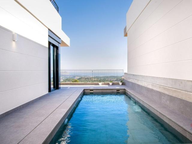 Nueva villa de 2 domitorios y 2 baños con magníficas vistas al mar en Polop Hills!