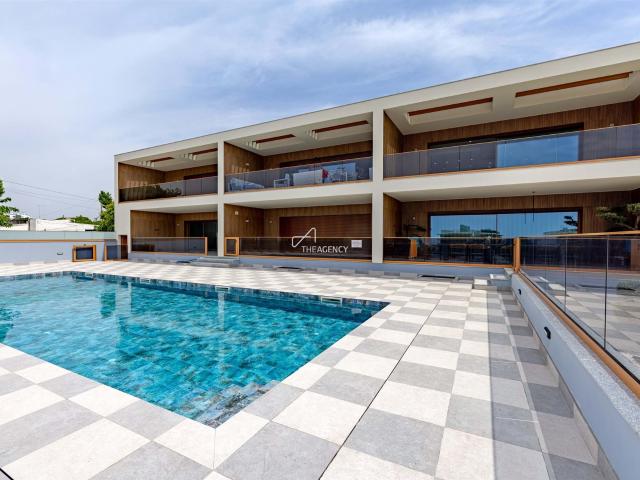 Oceanis Residence – Apartamento T2 com piscina e vista mar e. 291m² Quarteira