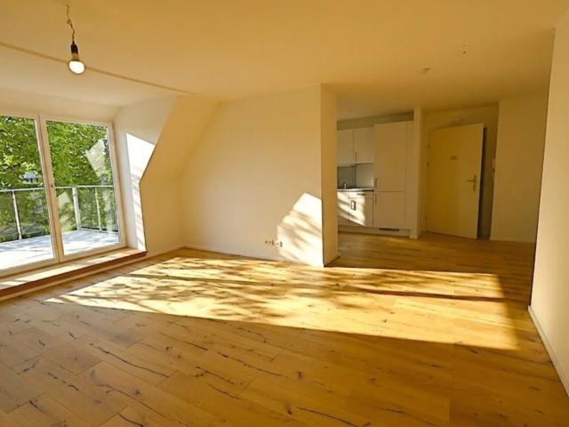 Offen gestaltete DG Wohnung mit herrlichem Ausblick und Einbauküche!